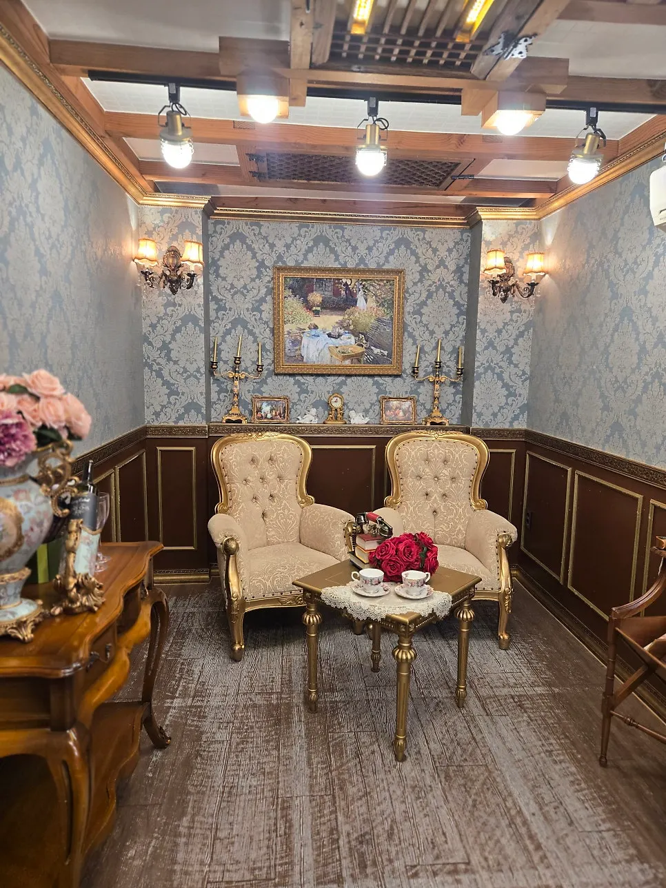 Historical drama-style costumes with hats and bag accessories on display