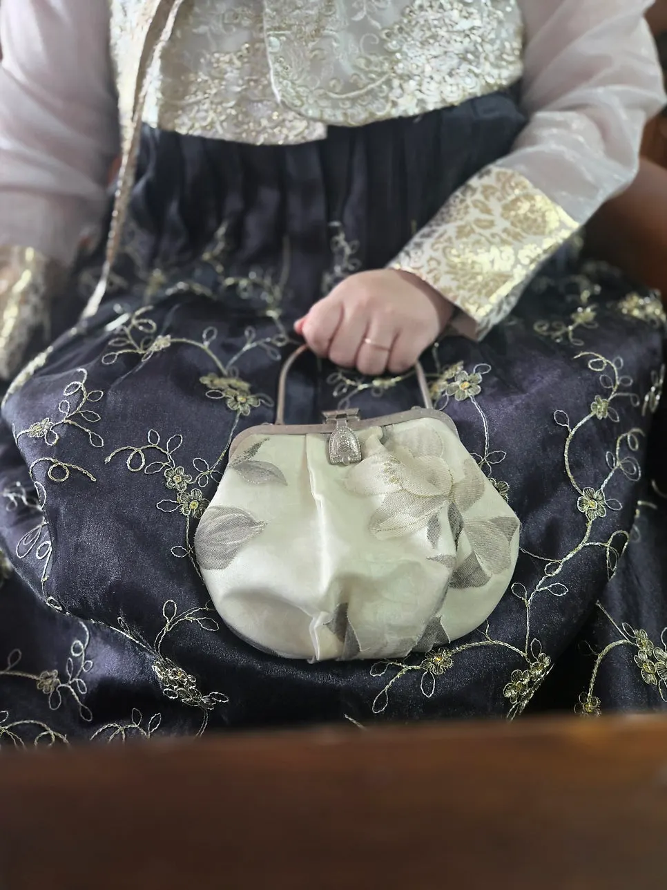 Black skirt with gold foil paired with a white jeogori