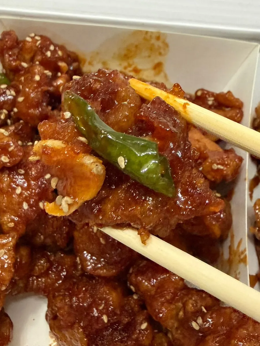 Spicy dakgangjeong enjoyed with beer