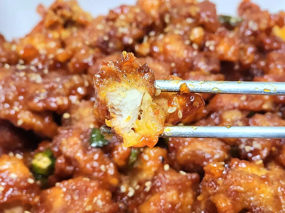 Leftover dakgangjeong container after two people ate