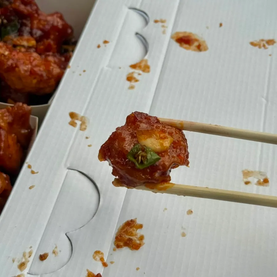 Spicy dakgangjeong coated in sauce