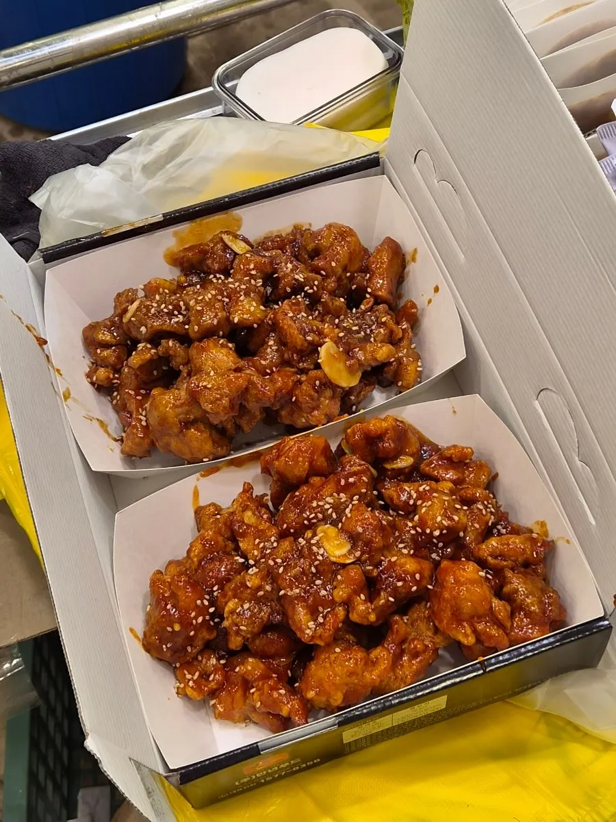 Takeout order of half seasoned and half soy-sauce dakgangjeong