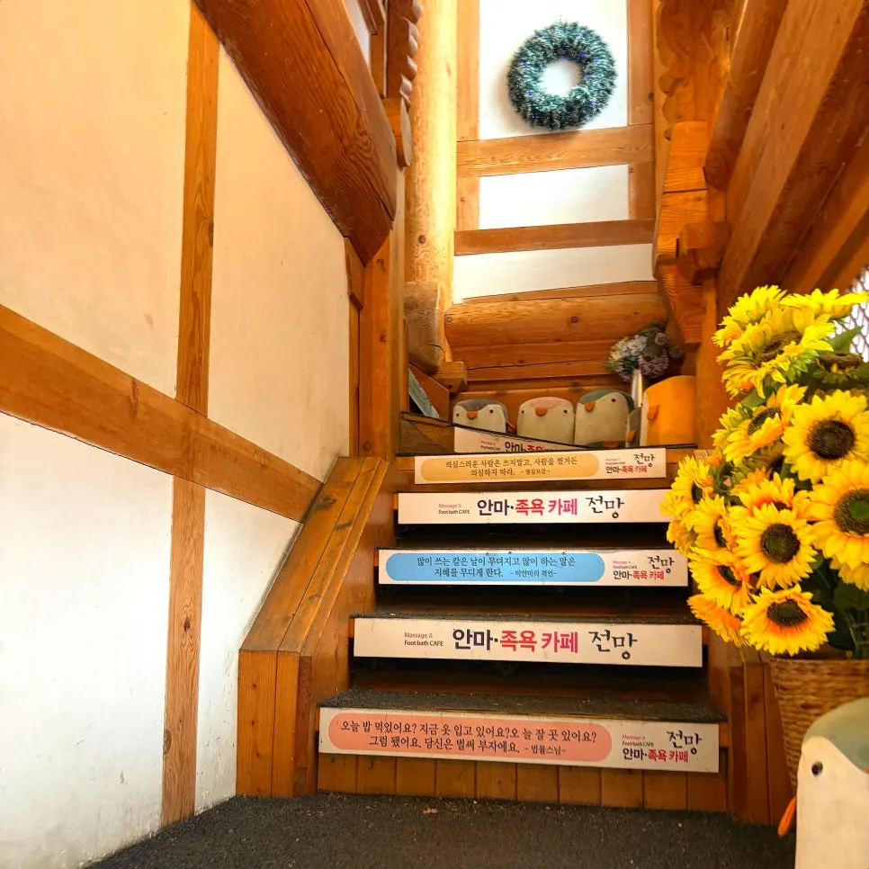 The café entrance with photos from TV features posted outside