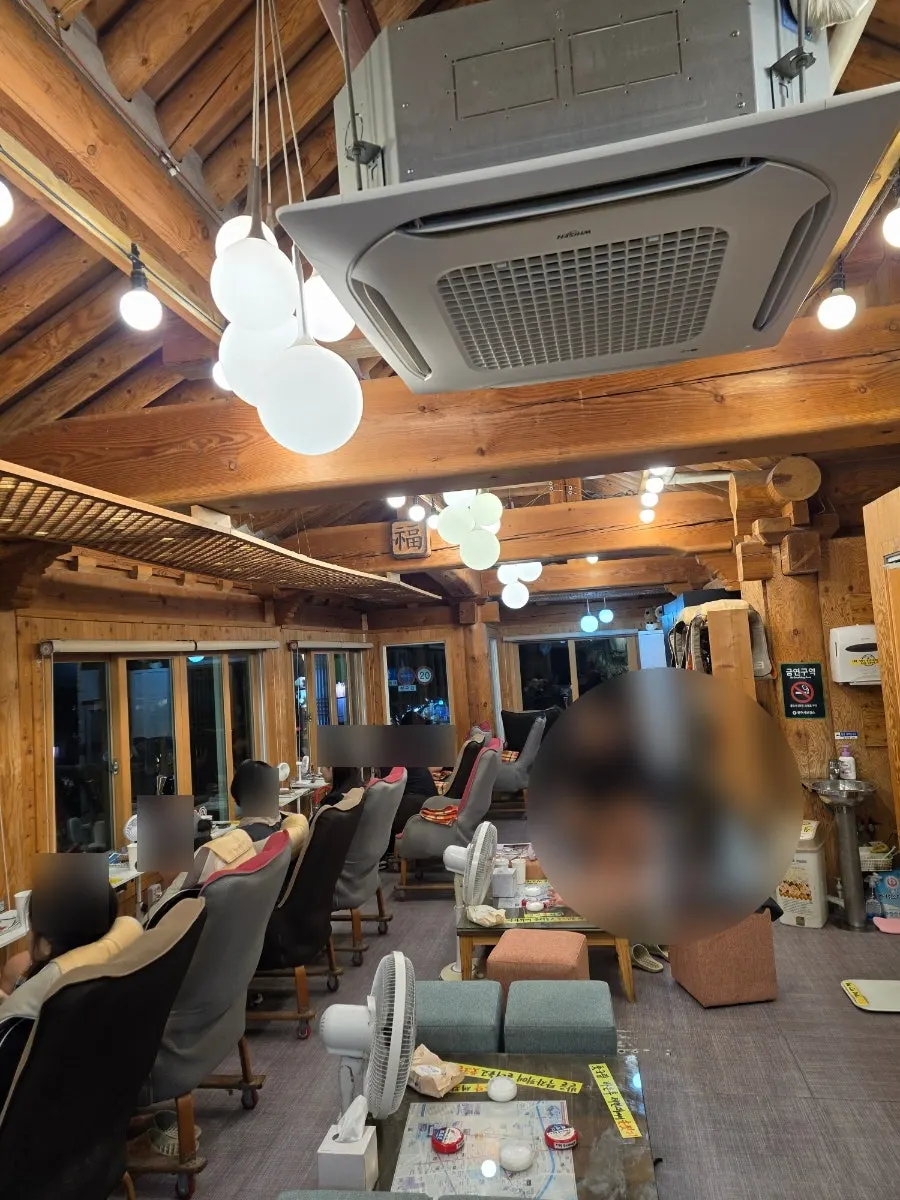 2nd-floor window foot bath seats overlooking the hanok village