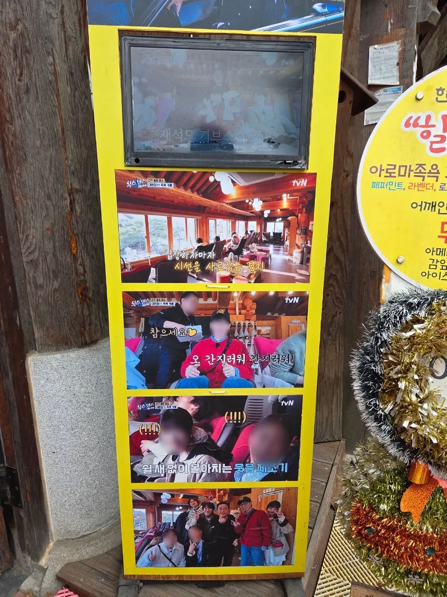 Large yellow sign explaining the healing course