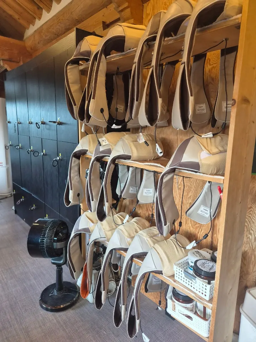 Several shoulder massagers set up for use