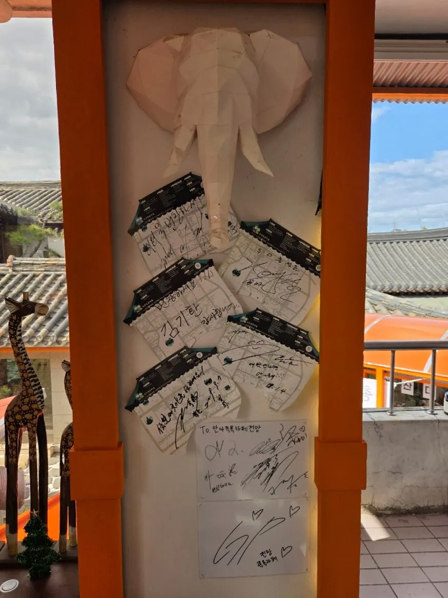 Celebrity signatures displayed at the café