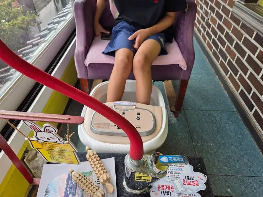 Café seating where guests can enjoy a foot bath