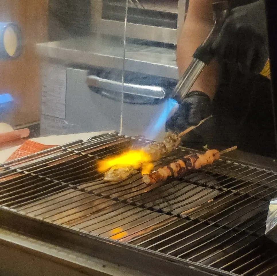 Skewers being grilled fresh right after the order