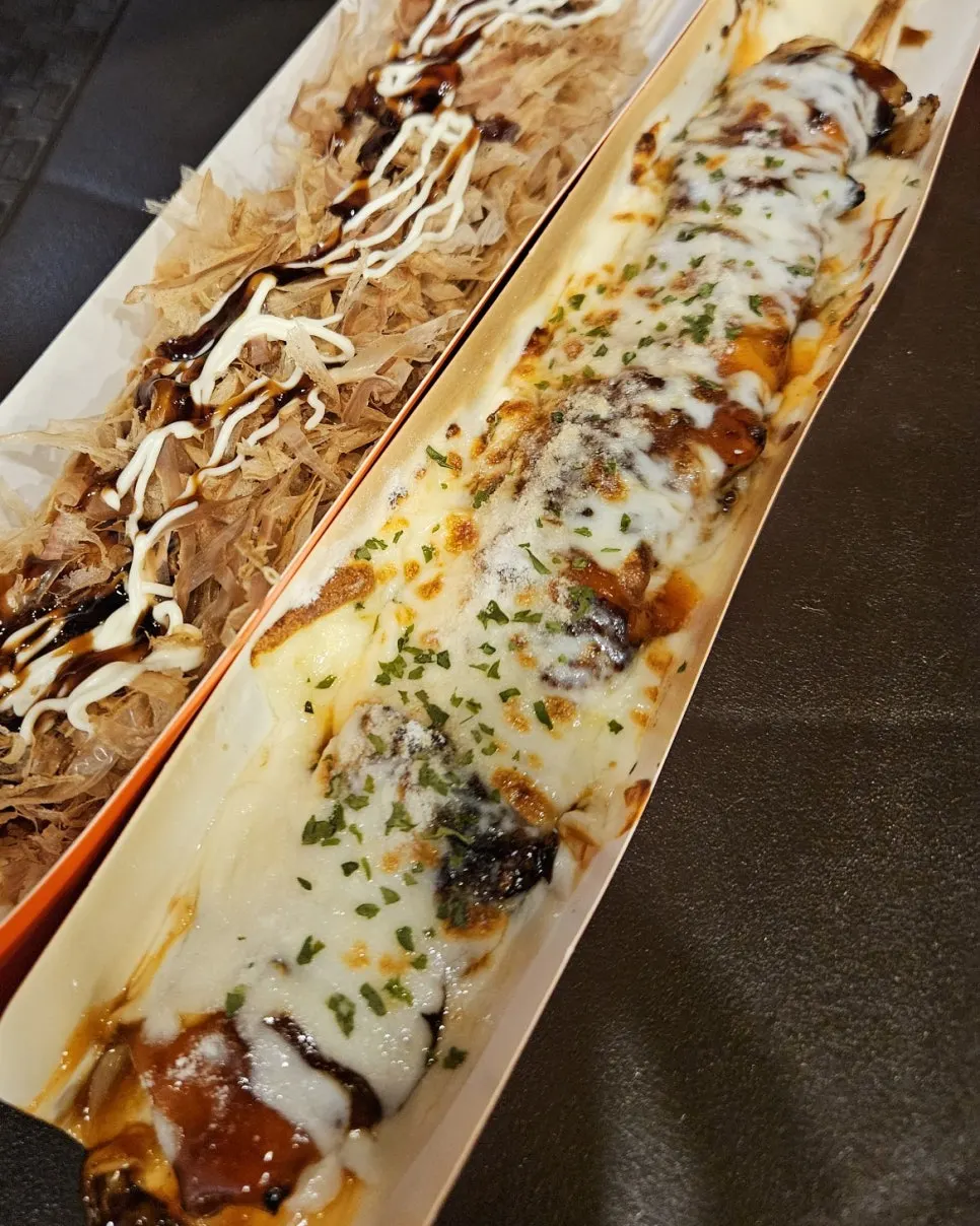 Cheese chicken skewer piled high with cheese