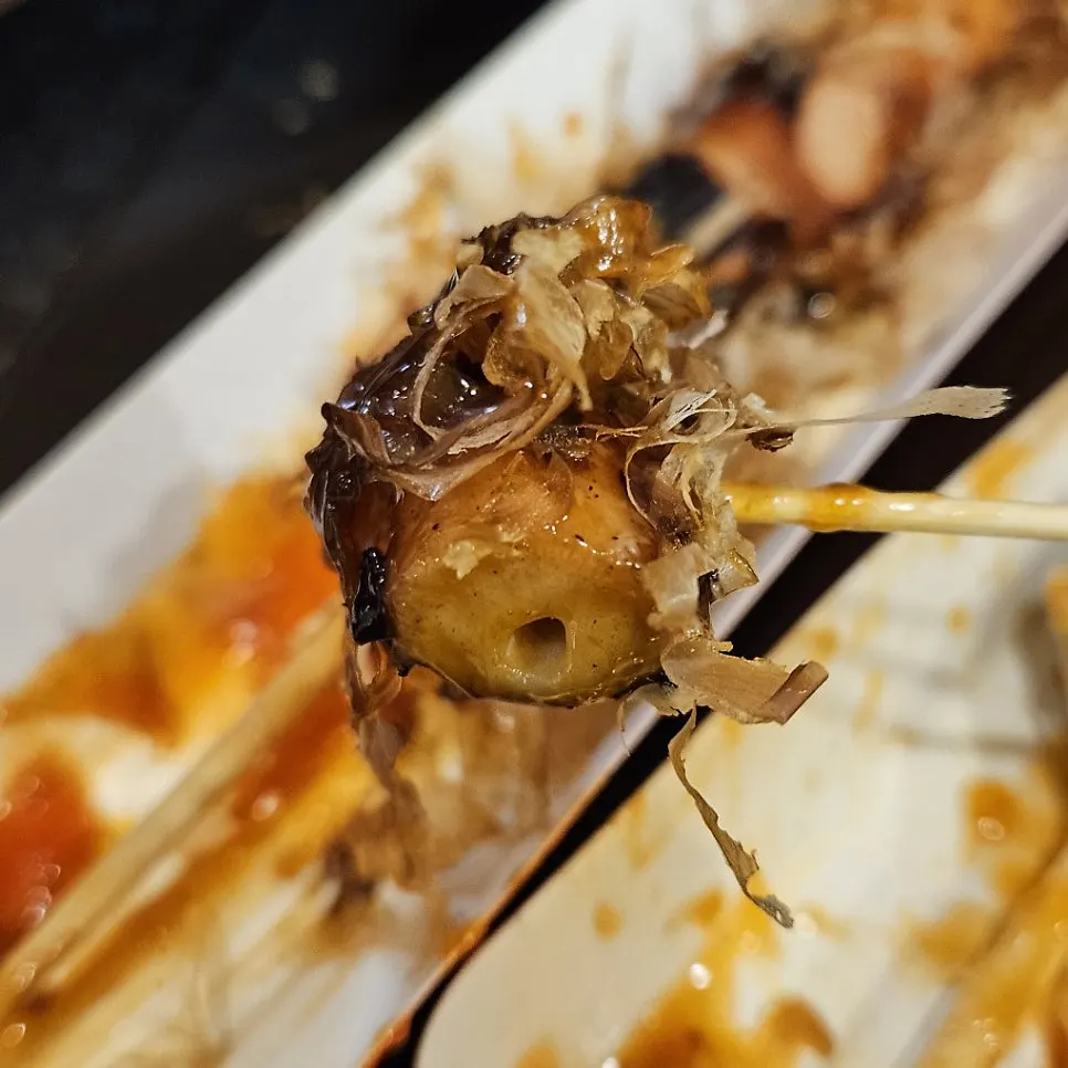 Tender boiled-then-grilled octopus piece