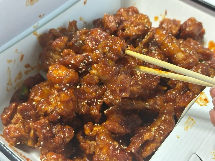 Opened takeout box of the large shrimp+chicken dakgangjeong