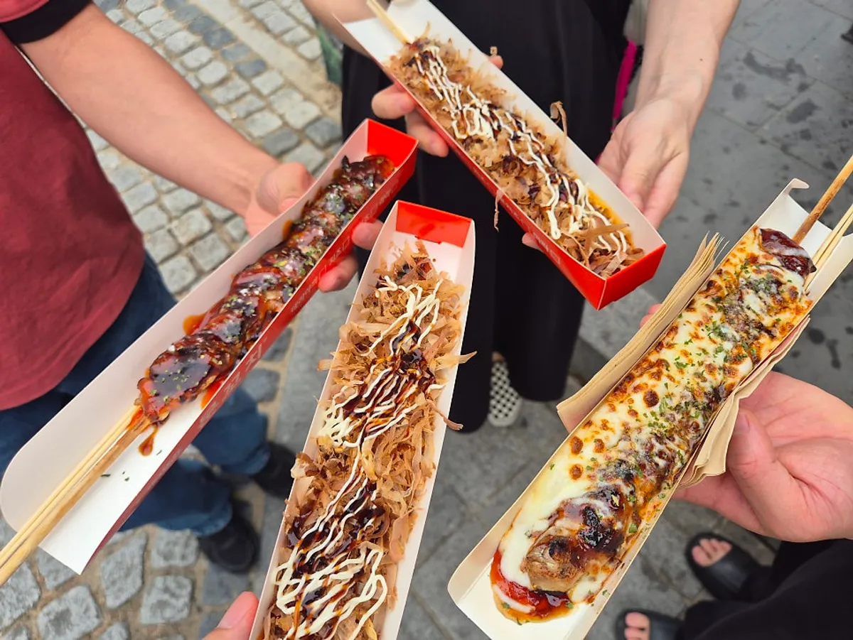 Freshly grilled octopus and chicken skewers