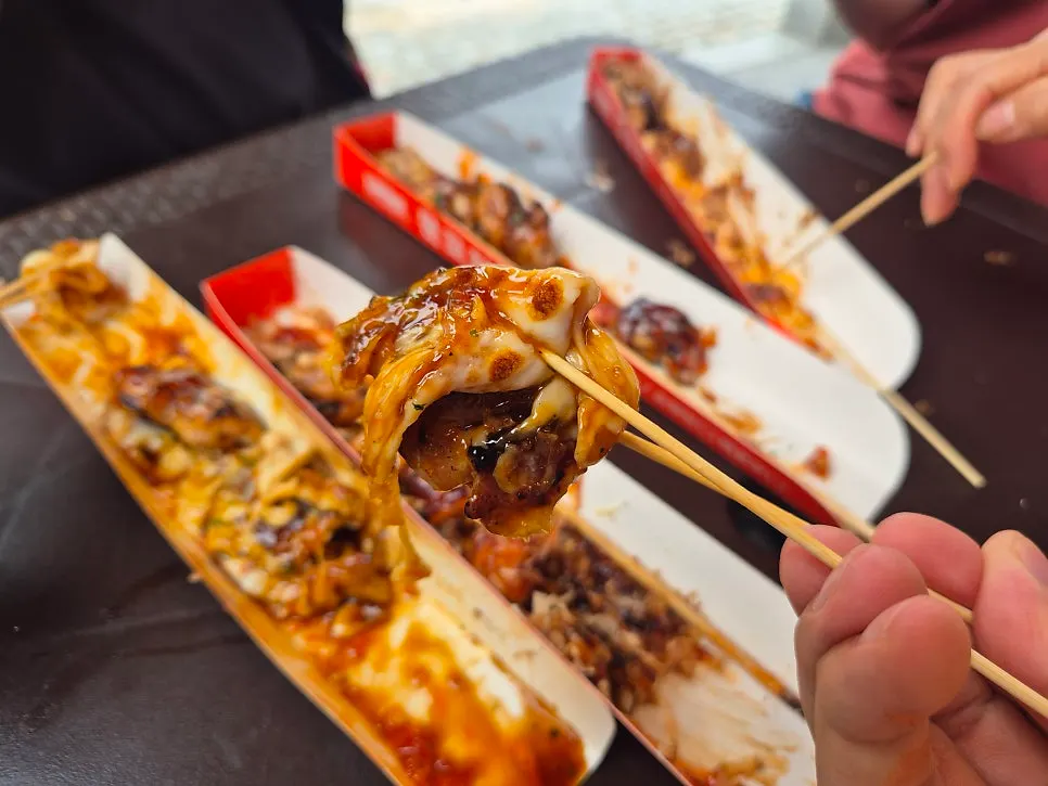 Mala octopus skewer topped with mala sauce