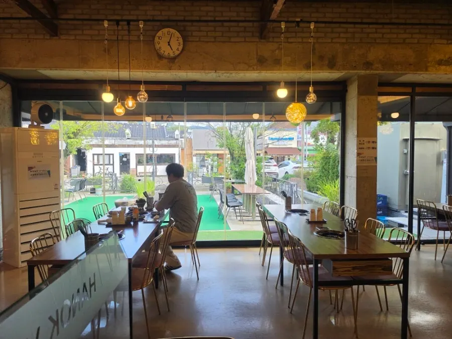 Interior with a hanok-style ceiling feel