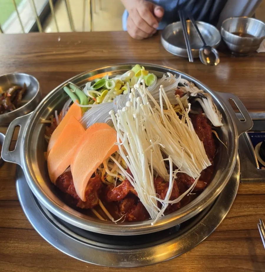 Galbi hot pot served with side dishes