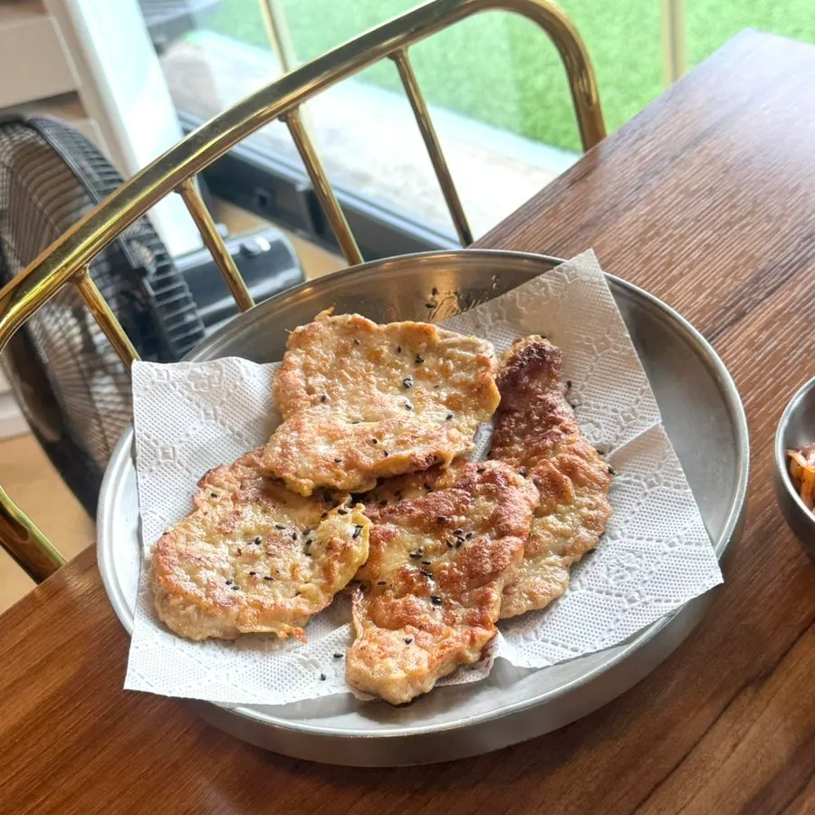 Plate of golden pan-fried Jeonju yukjeon