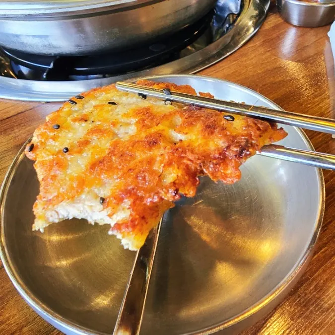 A thick piece of pan-fried yukjeon