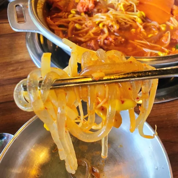 Seasoned glass noodles and red hot pot broth