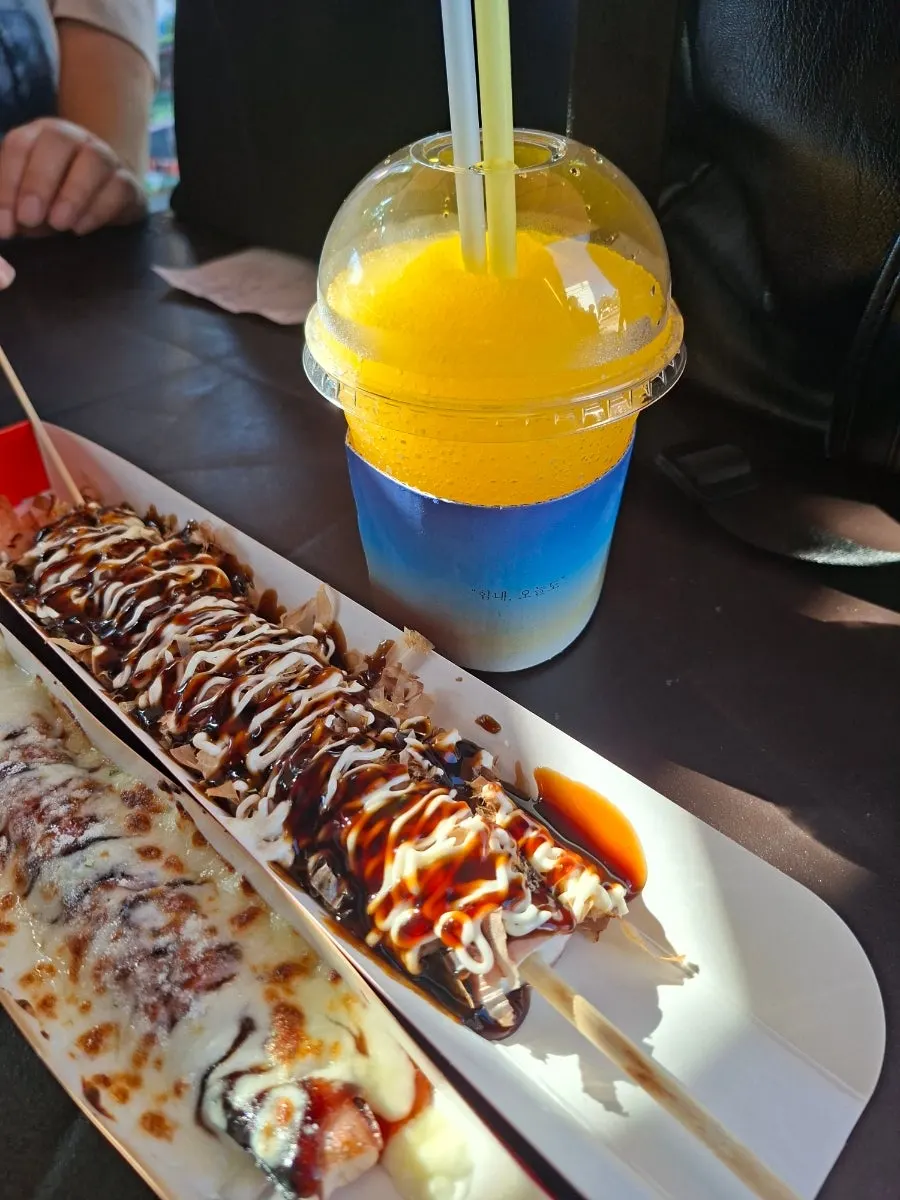 Cheese octopus skewer piled high with melted cheese