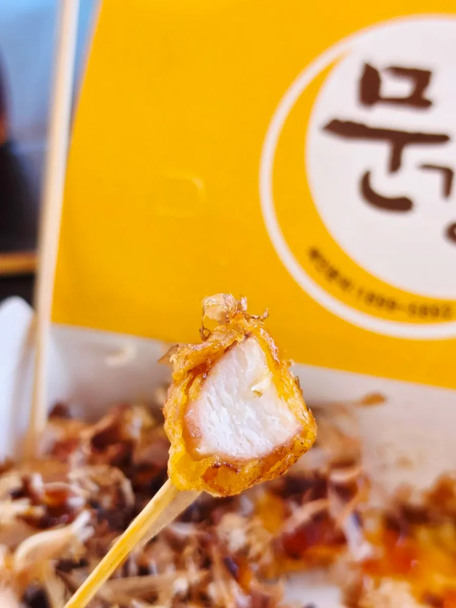 Mungangjeong topped with teriyaki mayo sauce and bonito flakes