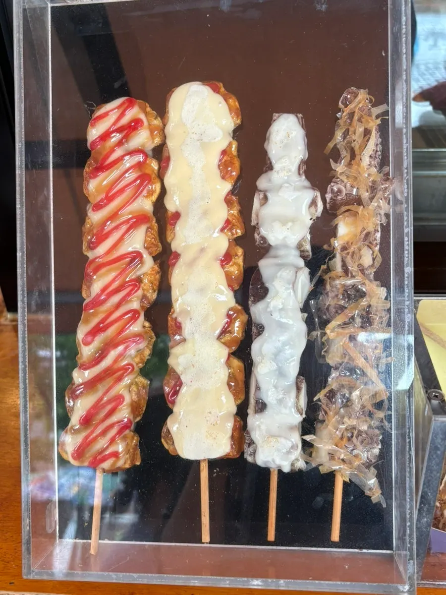 Realistic food models displayed in front of the counter