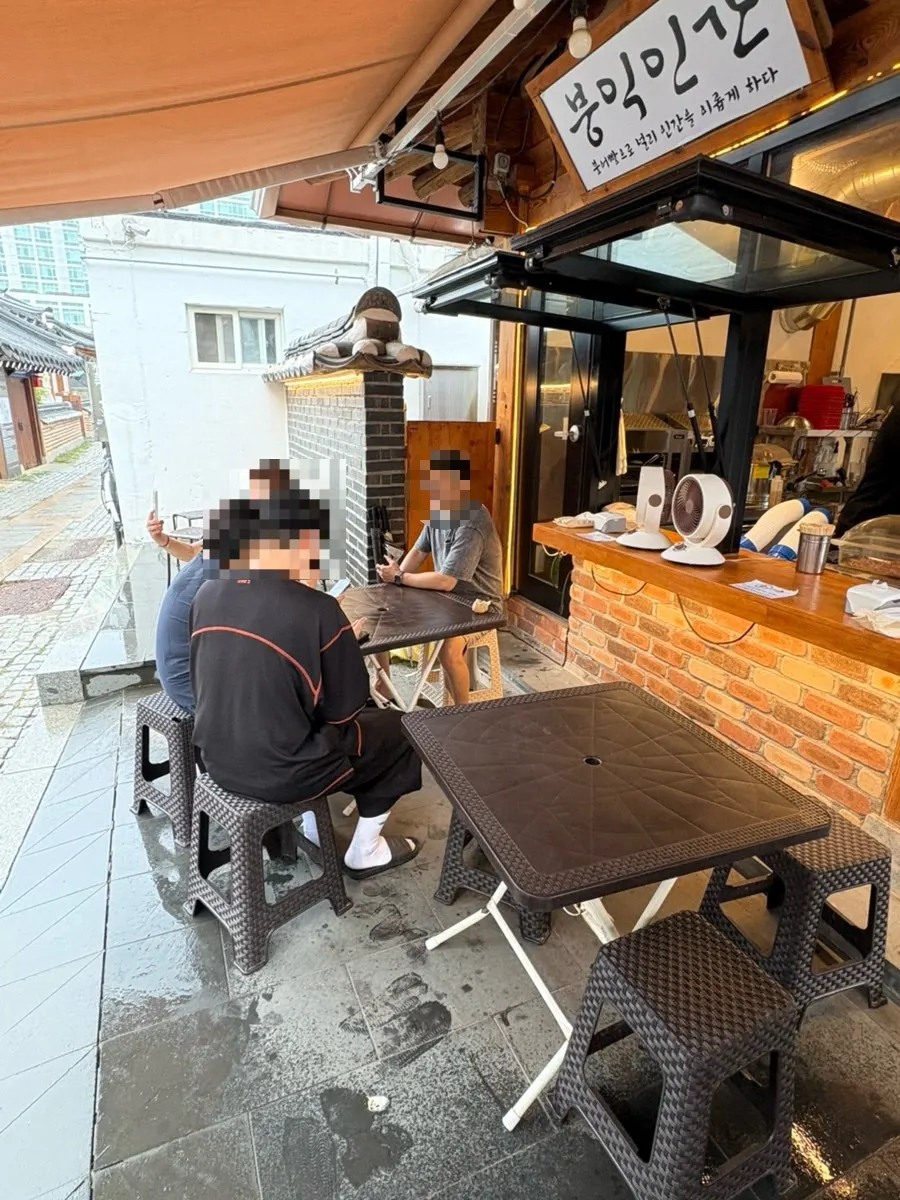 Outdoor simple table area behind the shop