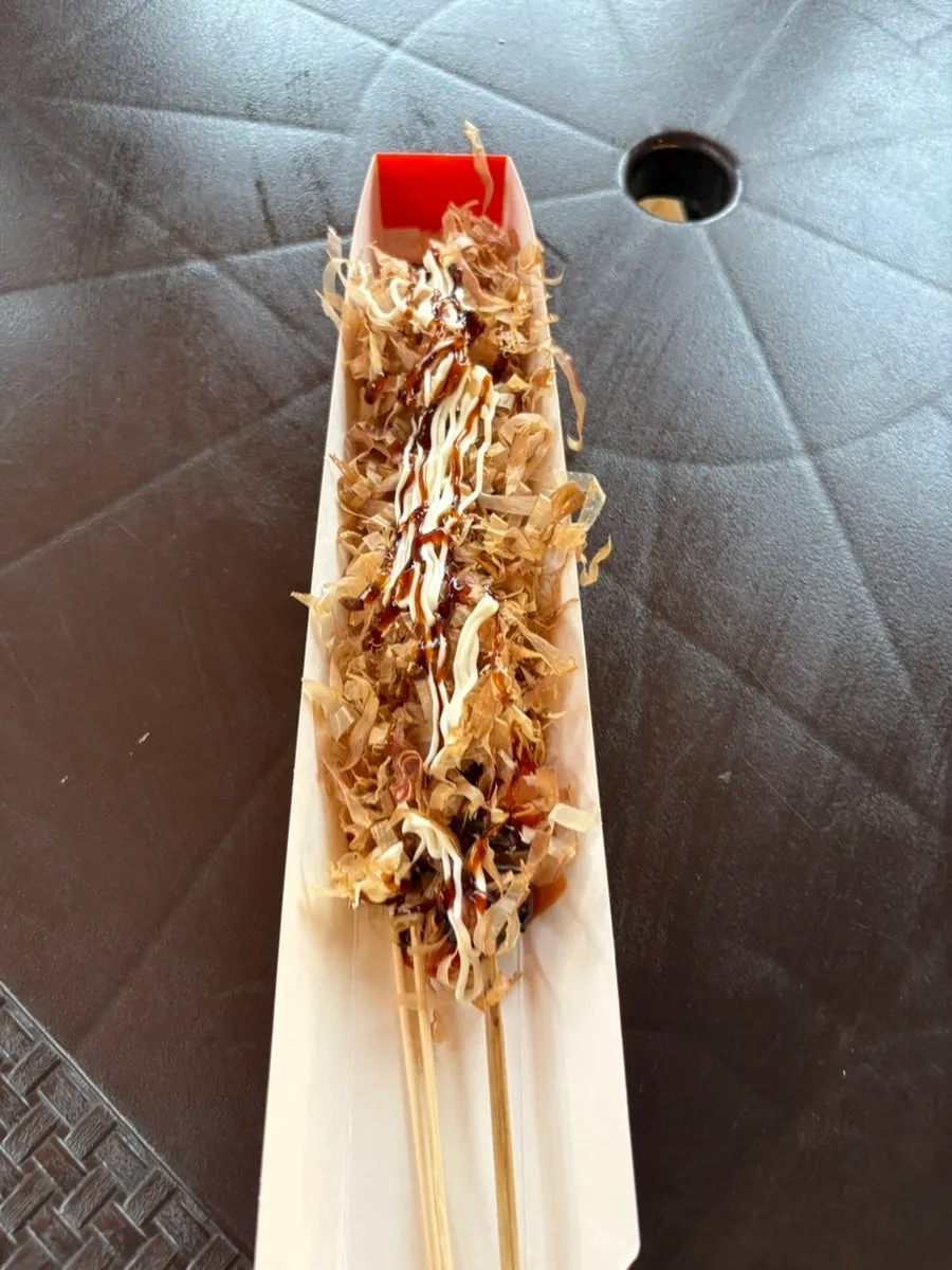 Freshly grilled, hot octopus skewer