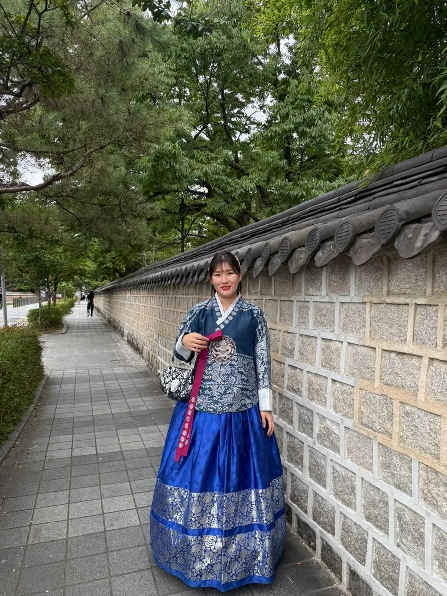 Hanbok outfit at a Hanok Village photo zone