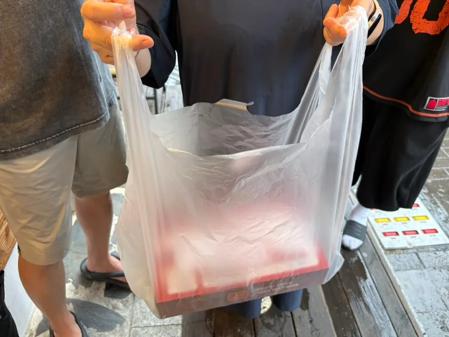 Packed box of dakgangjeong ready to go