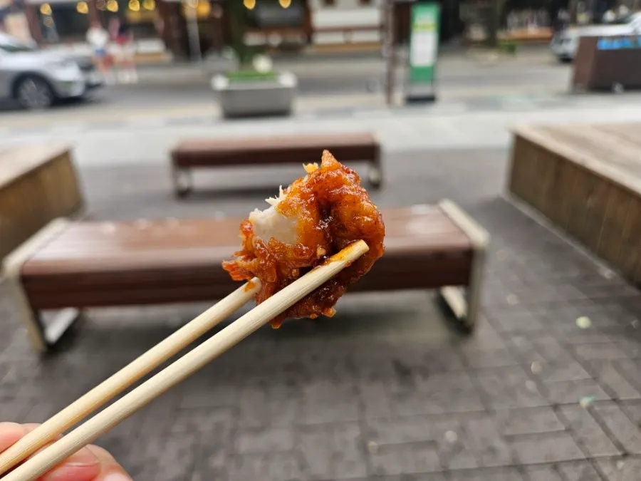 Cross-section of dakgangjeong showing the crispy coating