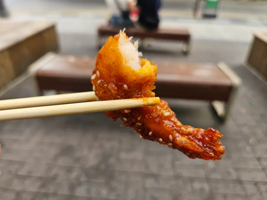 Picking up one piece of shrimp gangjeong