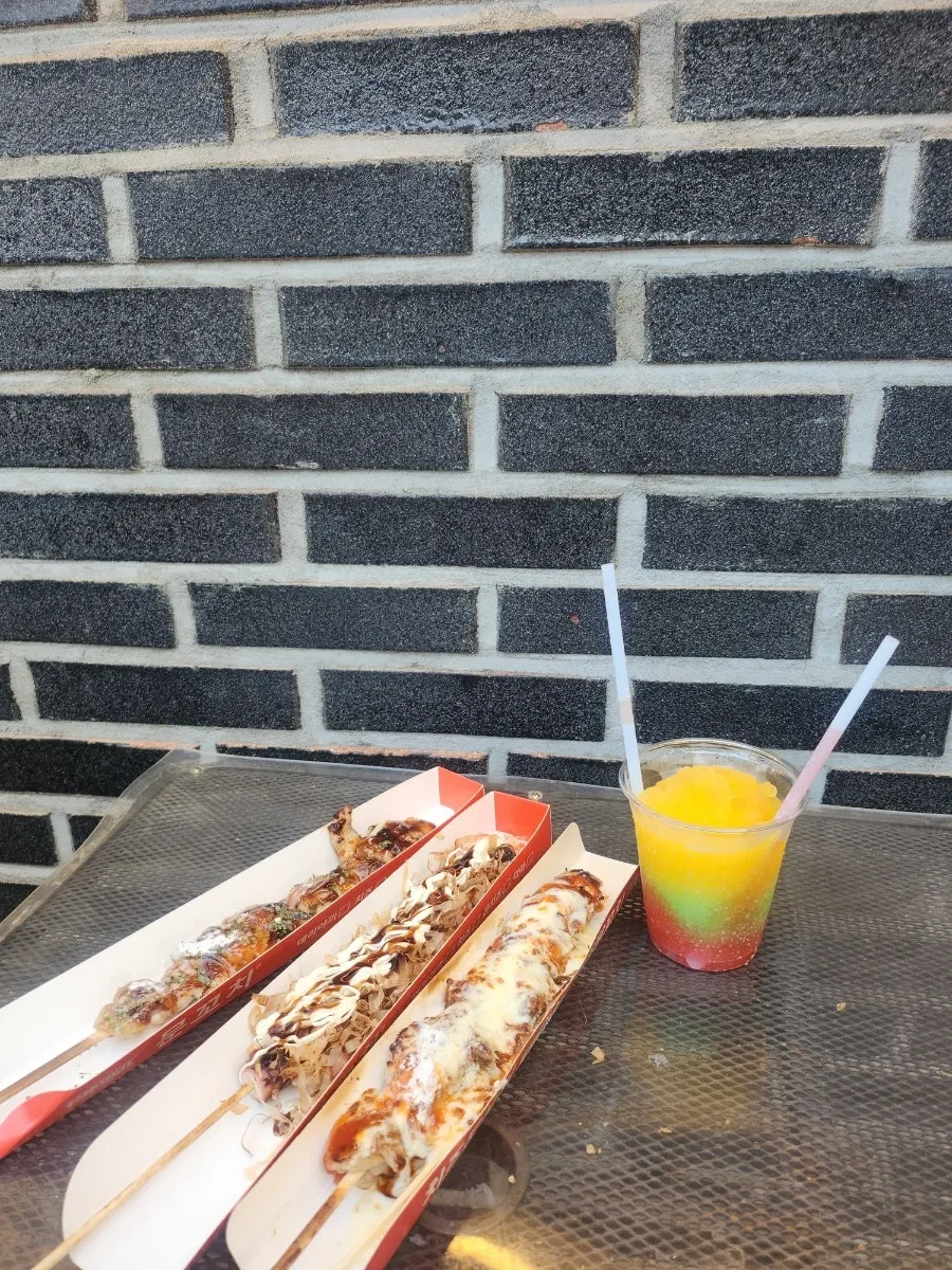 Table seating on the side of the shop
