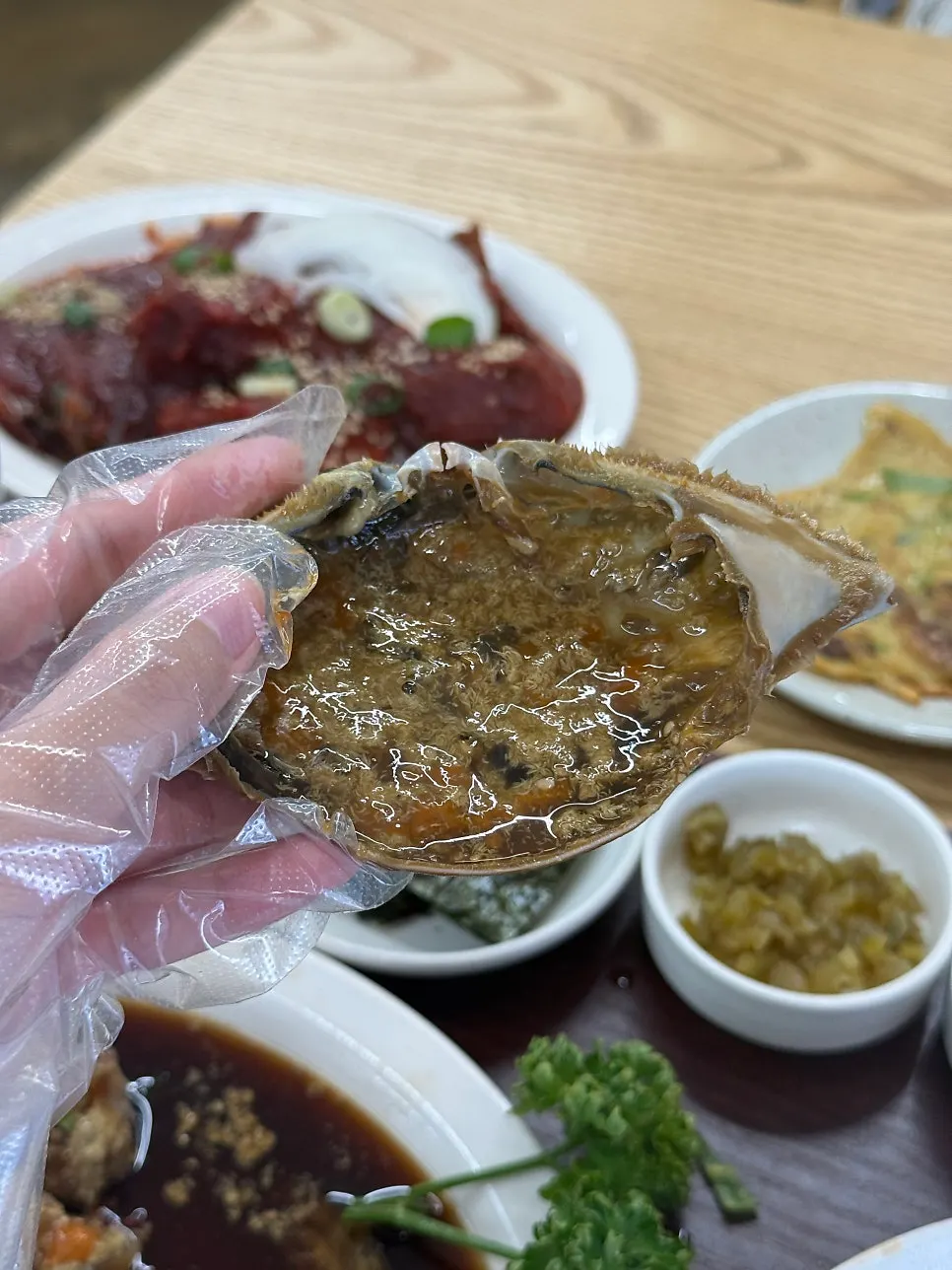 Cross-section of soy sauce crab full of roe