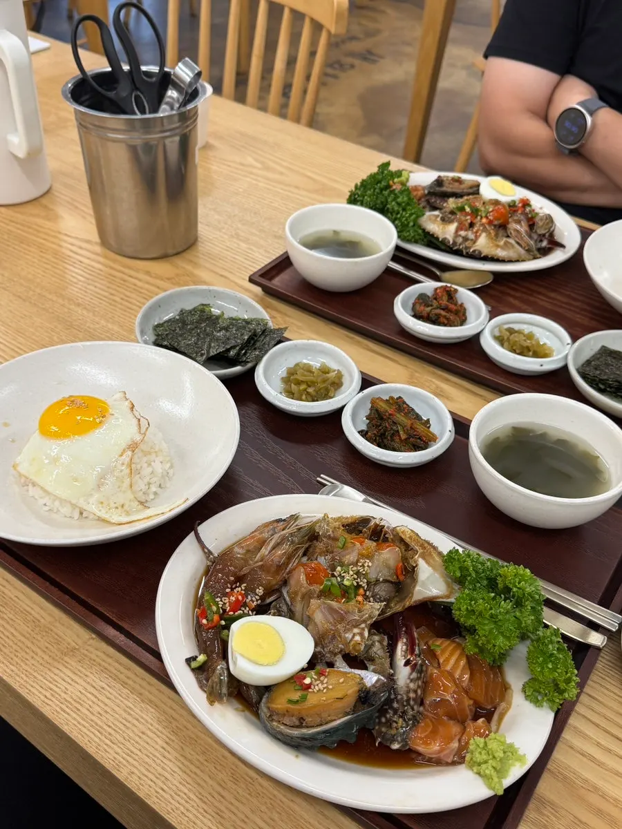 Soy-marinated crab and assorted seafood