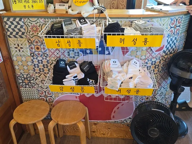 Foot bath café interior and sock sales information