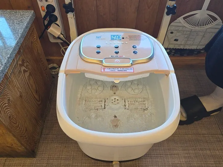 Enjoying a foot bath while looking out the window