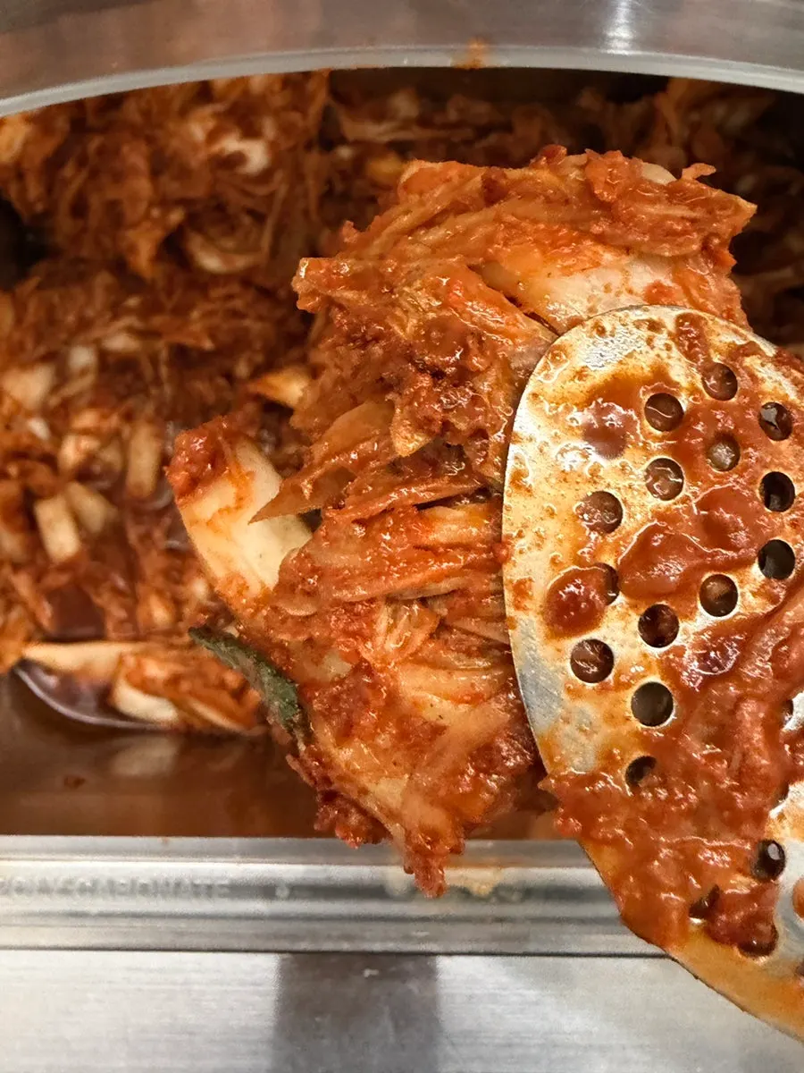 Spicy kimchi eaten alongside the kalguksu