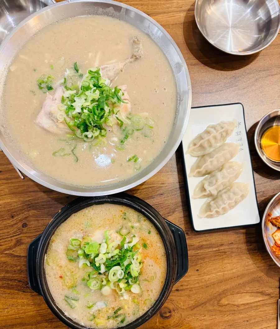 Chicken kalguksu with half a chicken and thick noodles
