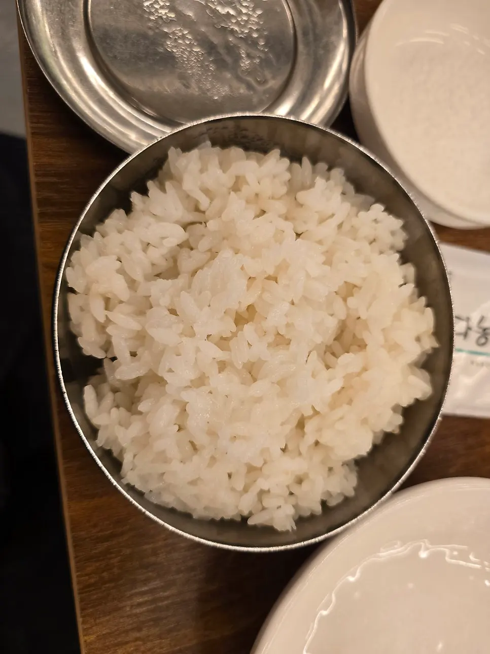 Beef served together with a bowl of rice