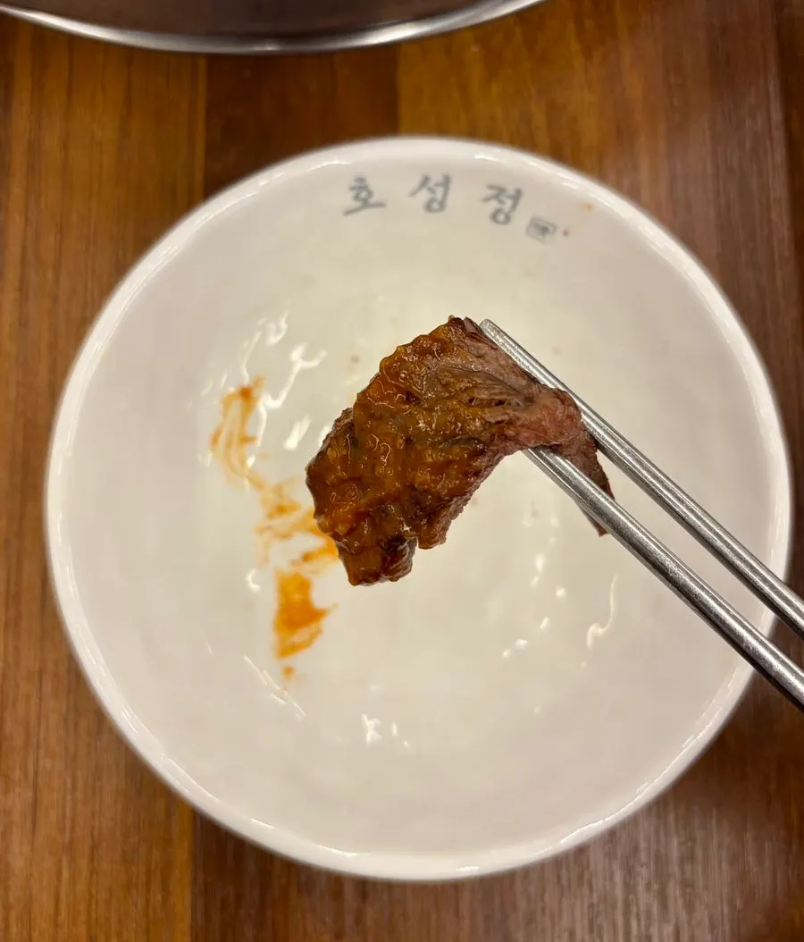 Hanwoo sirloin grilling on the grill plate
