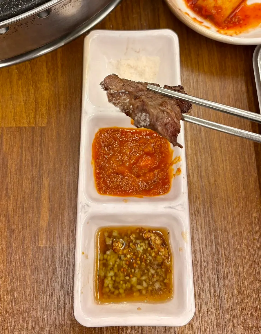 Hanwoo chadolbaegi cooking to a golden brown