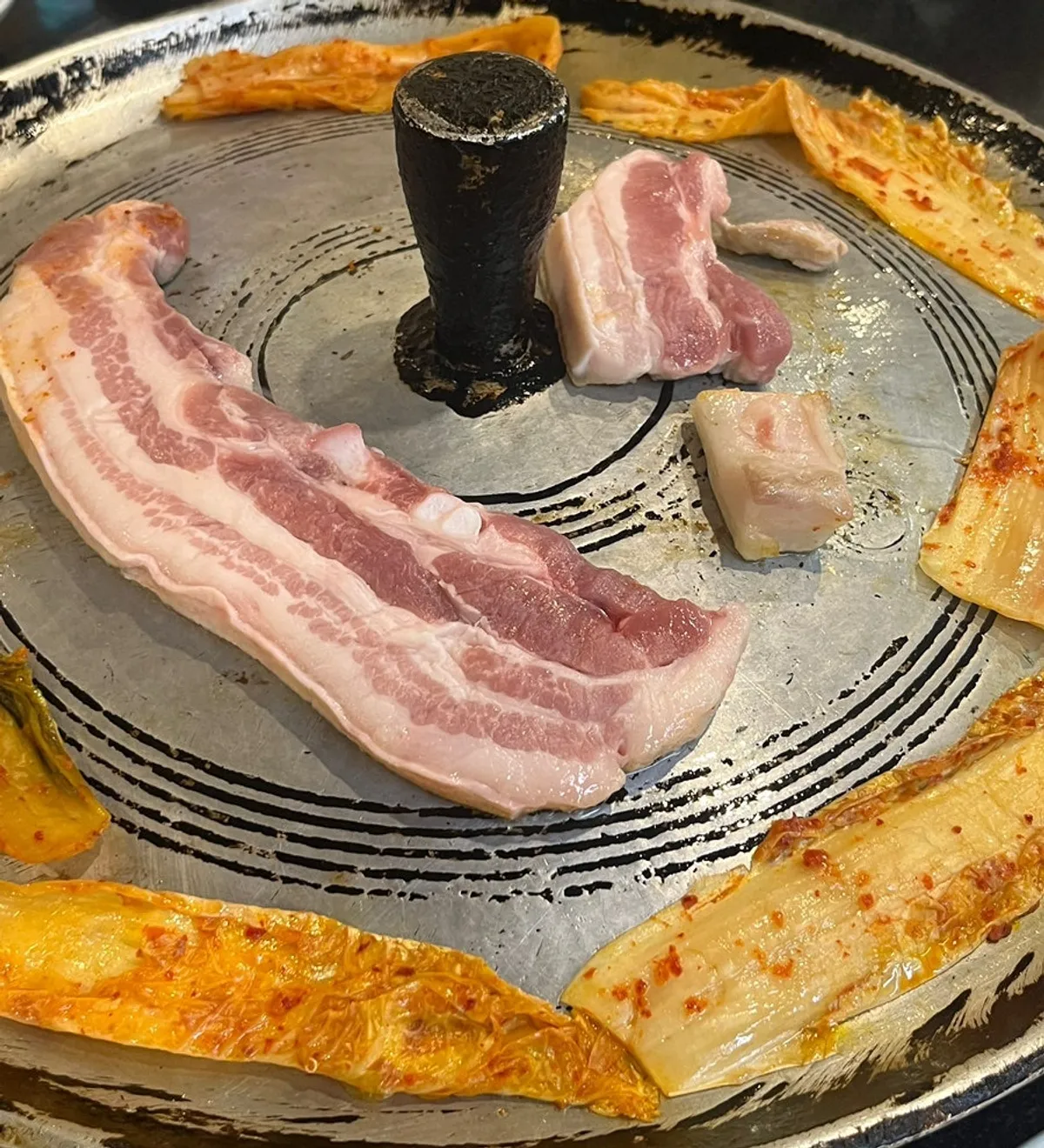 Signature photo of aged-kimchi pork belly at Jeonju House in Yuseong, Daejeon