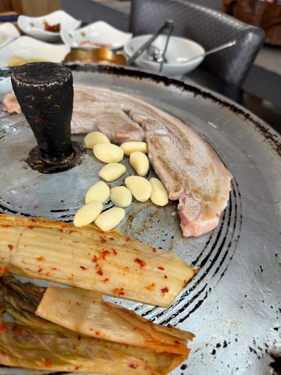 A piece of pork belly grilled golden brown