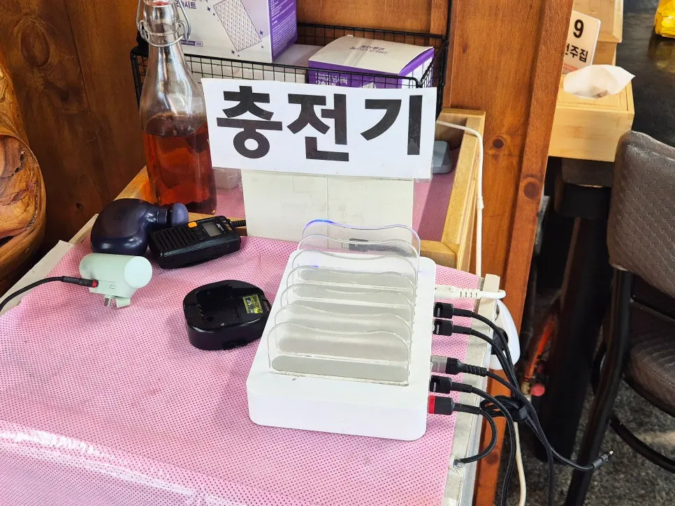 Phone charger set up in a corner of the restaurant