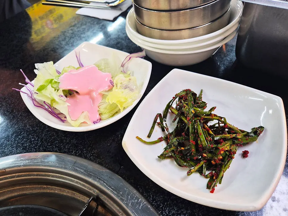 Basic side dish spread including salad and seasoned chives