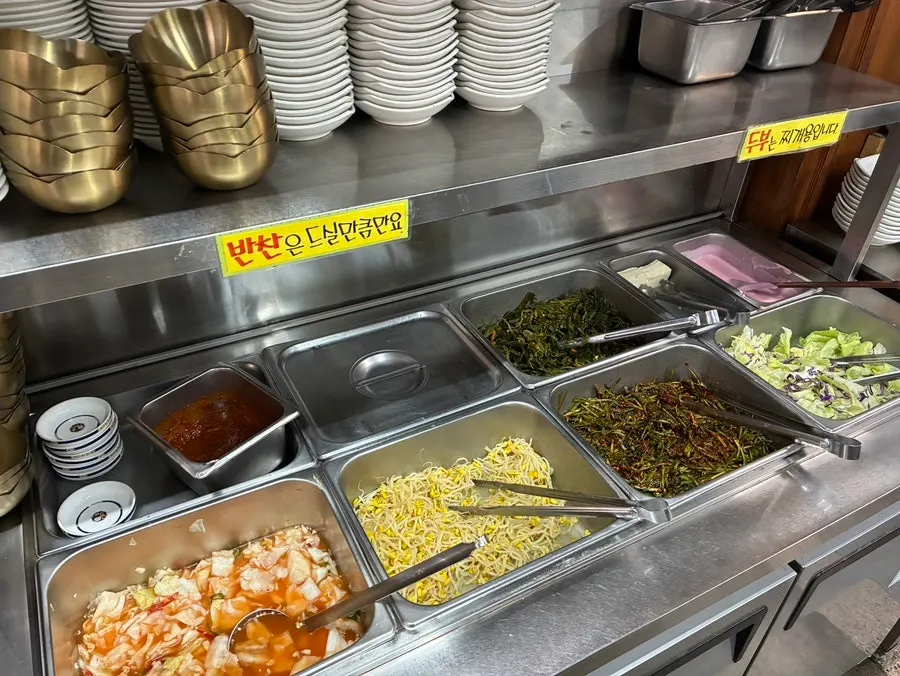 Bean sprout and salad side dishes at Jeonju House
