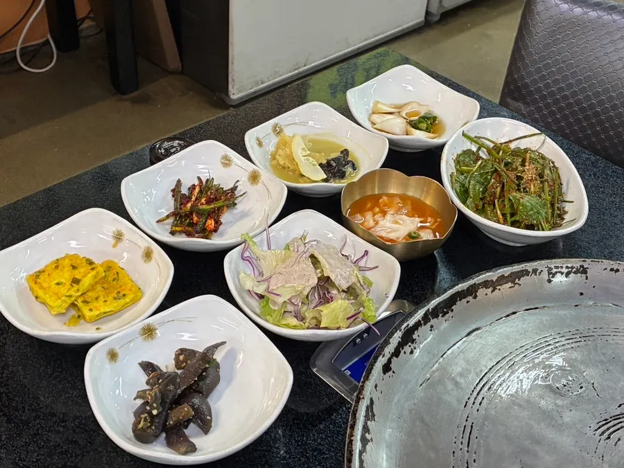 A full spread of side dishes at Jeonju House