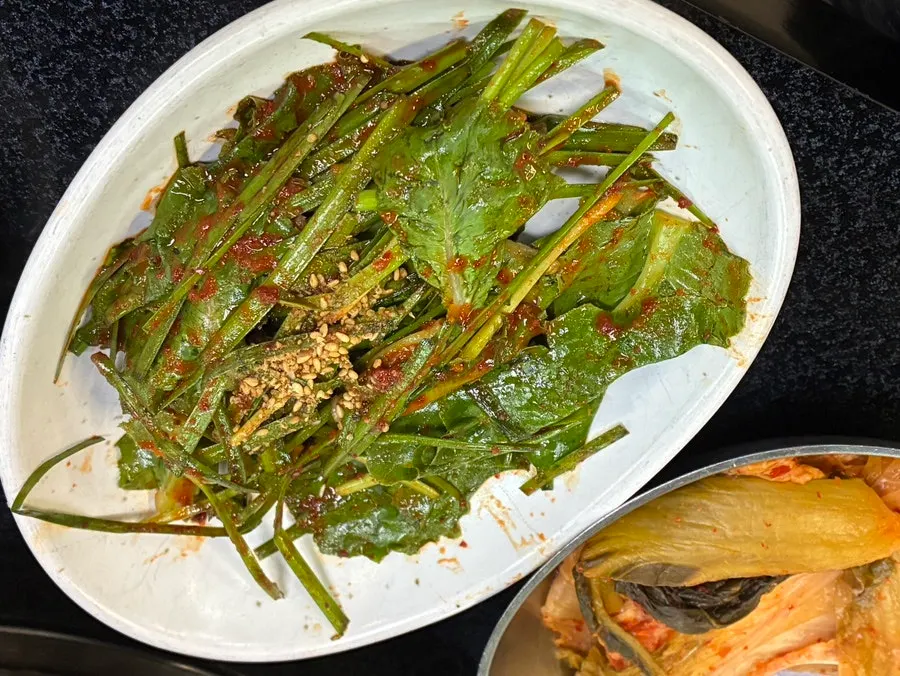 Dongchimi and seasoned vegetable side dishes at Jeonju House