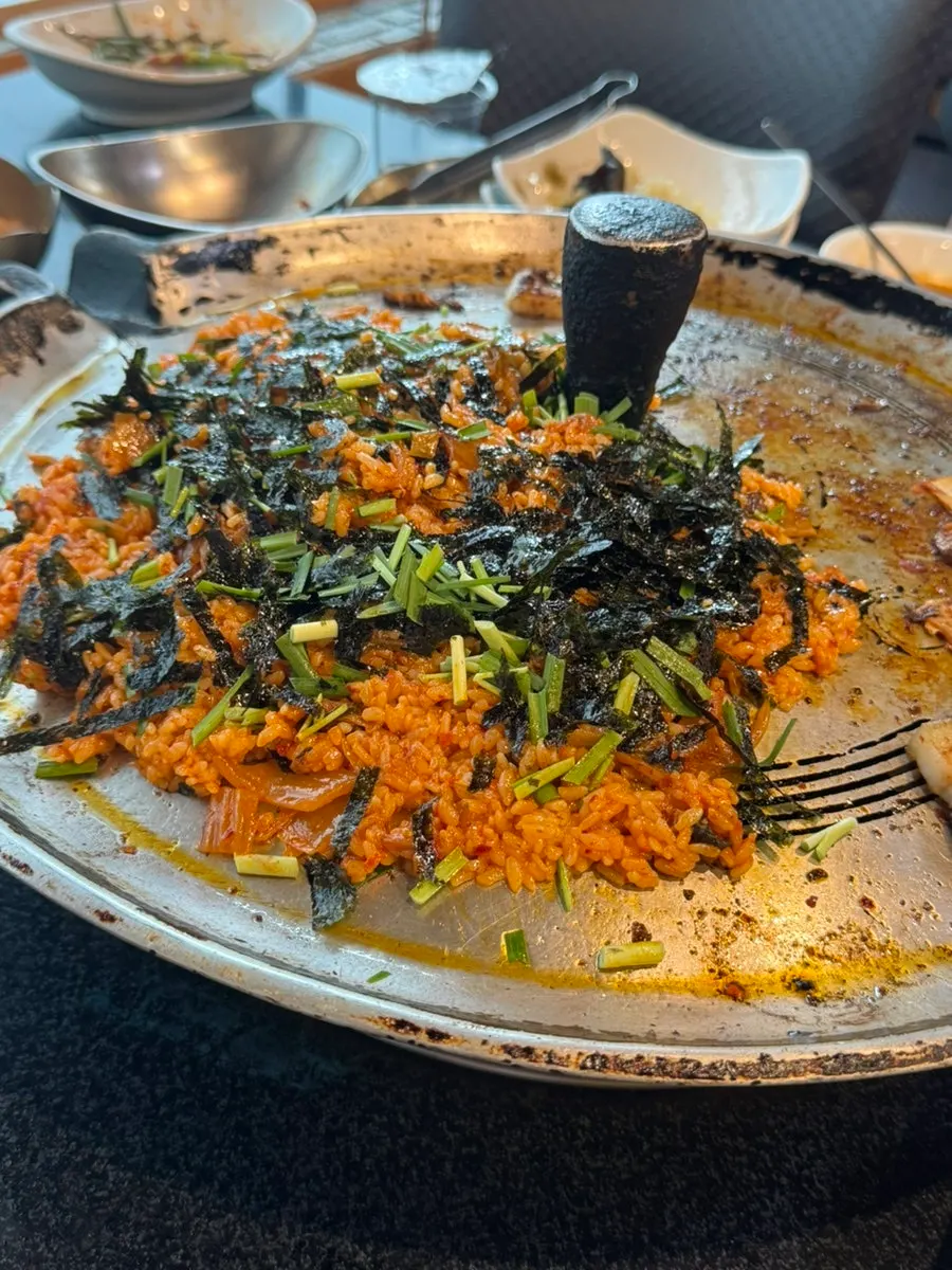 Fried rice made on the cast-iron lid